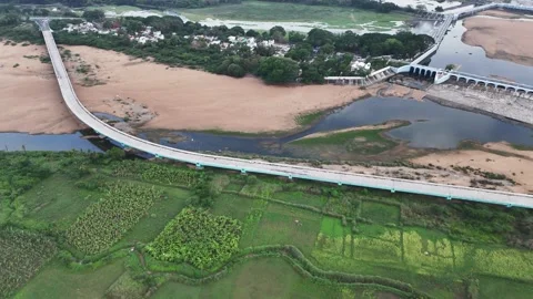 Drone shot capturing the iconic Kallanai dam system, where engineered Stock Footage 338053357