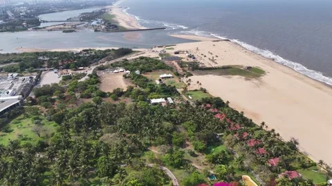 Drone shot capturing a seafood processing complex beside Kovalam Estuary Stock Footage 340324074