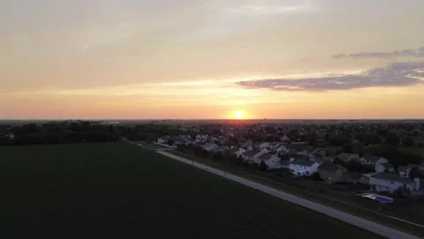 Drone Shot of Car Driving at Sunset Stock Footage 245467056