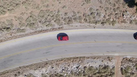 Drone shot of a car exploring the volcanic island. Stock Footage 168255231
