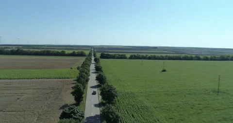 Drone shot of a car on the road Stock Footage 150803828