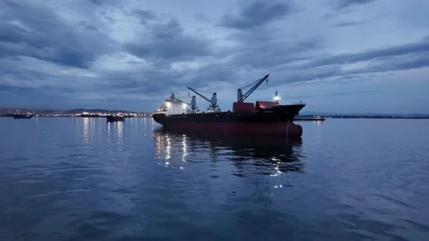 Drone Shot of Cargo Ship in Marmara Sea at Twilight, Turkey 動画素材 336263684