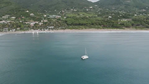 Drone Shot of Catamaran Floating in Scenic Coastal Bay – 4K Aerial Footage Stock Footage 310180935