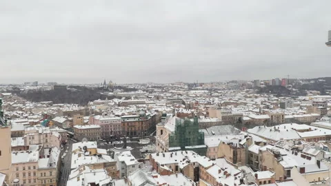 Drone Shot of the Charming Ancient Snow Covered Old City Center. Stock Footage 263887408