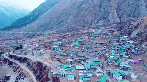 Drone Shot of Chitkul – Remote Mountain Village with Traditional Architecture Stock Footage 332861045