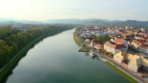 Drone Shot Of City Alongside A River Stock Footage 136096244