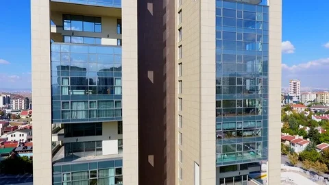 Drone shot of city behind the skyscraper Stock Footage 80965119