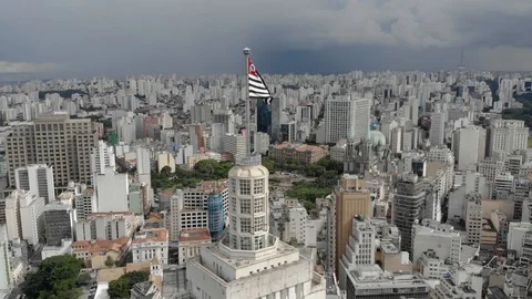 Drone shot of the city Sao Paulo Banespa building with city flag Sao Paulo Stock Footage