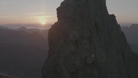 Drone shot of climber abseiling from Inaccessible Pinnacle, Cuilin Ridge, Skye Stock Footage 314193550