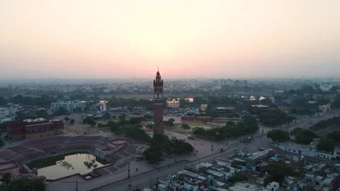 Drone shot of the Clock Tower in Lucknow, captured in the golden light of the Stock Footage 299251153