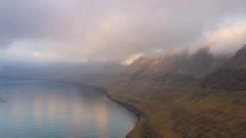 Drone Shot Of Clouds And Mist Over Fjord Video stock 134283826