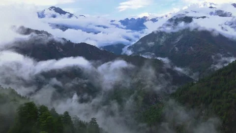 Drone Shot of a cloudy Sainj Valley in Himachal Pradesh near Manali, Kasol Stock Footage 211791433