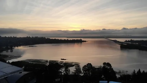 Drone shot of a cloudy sunset Video stock 102131726
