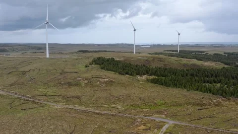 Drone shot of a community wind farm on the Hebrides Stock Footage 327831028