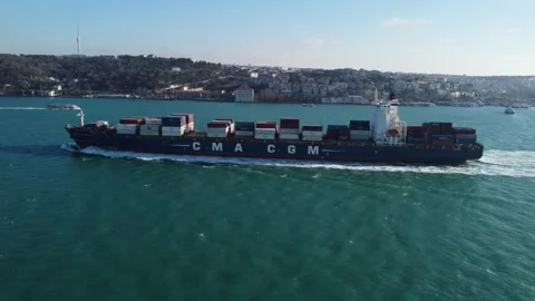 Drone shot of a container ship sailing in the Bosphorus, Istanbul, Turkey 4K Stock Footage 168488579