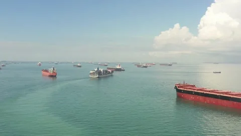 Drone shot of container vessel moving within Singapore Anchorage, Singapore Stock Footage 157572127