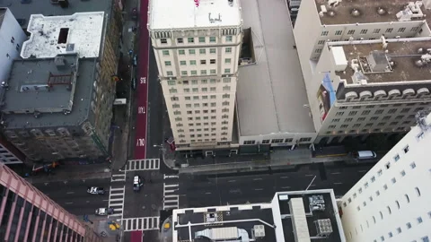 Drone shot of cops blocking off intersection in big city 4k Stock Footage 235634581