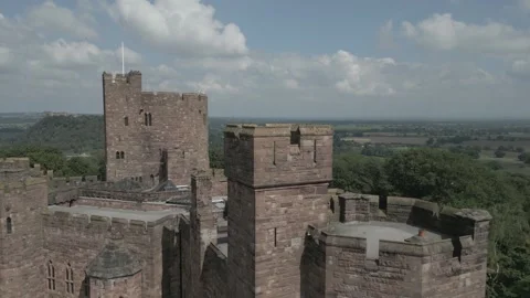 Drone shot of crazy amount of Swallows around castle in Cheshire Stock Footage 259290036
