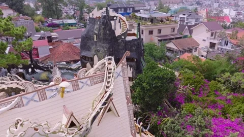 Drone Shot of the Curious Architecture of Crazy House with Scenic Backdrop Stock Footage 279211821