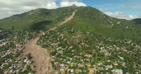 Drone shot of damage caused by mudslide in Blantyre, Malawi-Cyclone Freddy Video stock 245983136