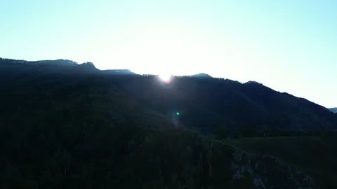 Drone shot of dawn in mountains with forest Stock Footage 227126536