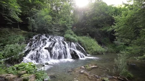 Drone shot of a deep forest waterfall Stock-Footage 143938610