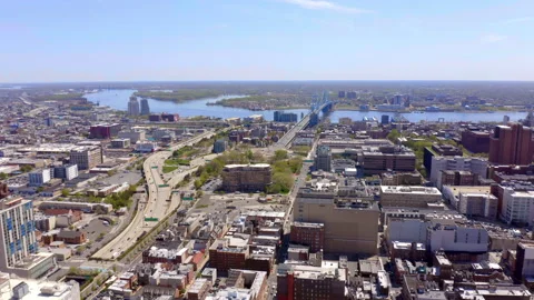 Drone Shot of Delaware River and Ben Franklin Bridge Philadelphia New Jersey Video stock 141229904