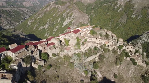 Drone shot of devastated Romagnano al Monte historic town after seismic disaster Stock Footage 317489604