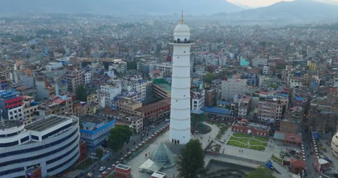 Drone shot of Dharahara tower and urban city of Kathmandu Nepal with roads Видео 334701228