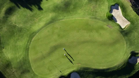 Drone shot directly above two golf players Stock Footage 264151807