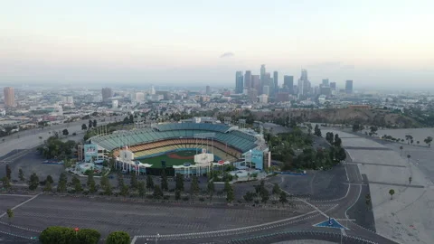 Drone shot of Dodgers Stadium with views of Los Angeles in the background Stock Footage 142813077