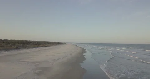 Drone Shot Down Desolate Beach Stock Footage 133539520