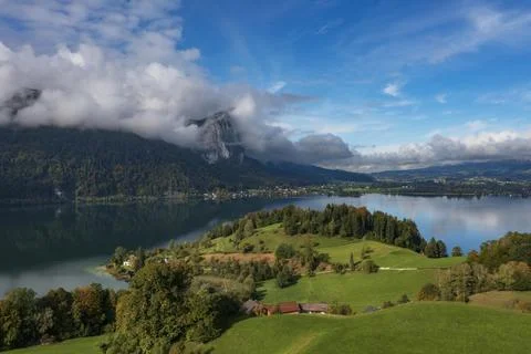 Drone shot dramatic cloud atmosphere at Mondsee near Pichlauhof with Stock Photos