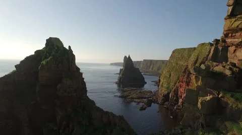 Drone shot of dramatic sea stacks at Duncansby Head near John O' Groats Stock Footage 57994751