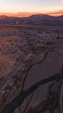 Drone shot of dramatic sunset in the mountains in Chos Malal Stock Photos
