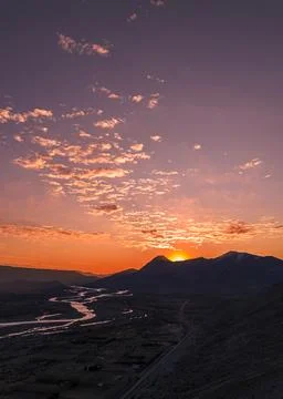 Drone shot of dramatic sunset in the mountains in Chos Malal Stock Photos