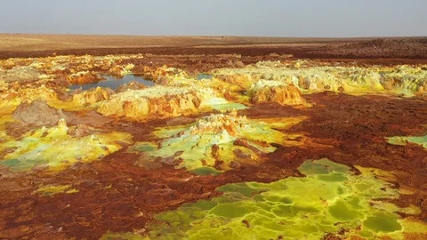 Drone shot of dramatic surreal landscape of sulfur deposits in Ethiopia Africa Stock Footage 114306477