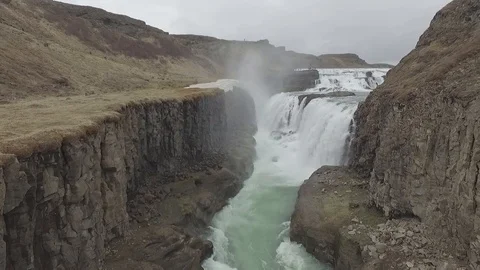 Drone shot: Drone flies in Gullfoss waterfall canyon, Iceland Stock Footage 93390847