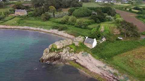 Drone shot drone flight over typical farmhouses on the Stran the Atlantic Ocean Stock Footage 205419610