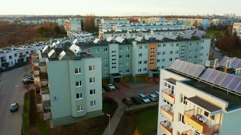 Drone shot from drone solar power plant located roofs buildings. Stock Footage 182385498