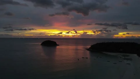 Drone shot during sunset at the beach Stock Footage 194380072