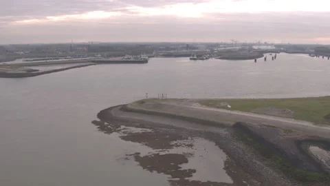 Drone shot from a Dutch harbor entry Video stock 220343784