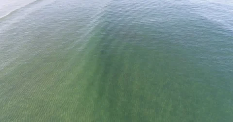 Drone shot of emerald sea surface texture The Concept of Summer Background Stock-Footage 327720699
