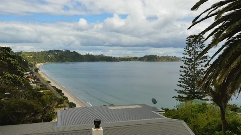 Drone shot empty beach with houses on the coastline Stock Footage 87723541