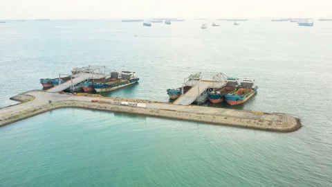 Drone shot of empty cargo ships moored, Singapore Stock Footage 151567773