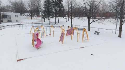 Drone shot of an empty park during winter in Canada Stock Footage 322924211