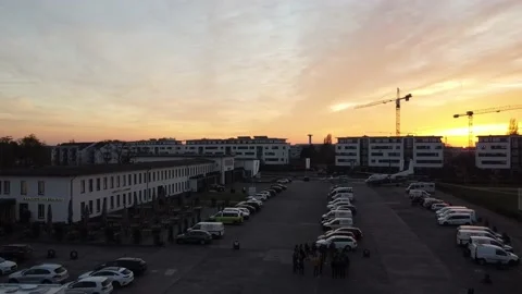 Drone shot in the evening at sunset over a parking lot Vídeos de archivo 236987879