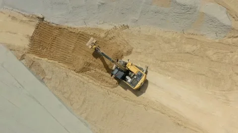 Drone shot of excavator working Stock Footage 132616614