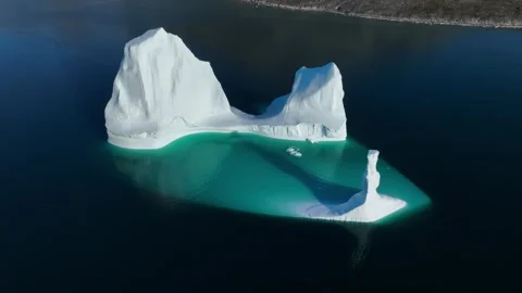 Drone shot of an extremely large iceberg drifting in East Greenland fjord Stock Footage 332369100