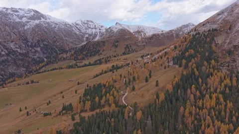 Drone shot of fall forest and famous Dolomites mountains in Italy. Stock-Footage 321551068